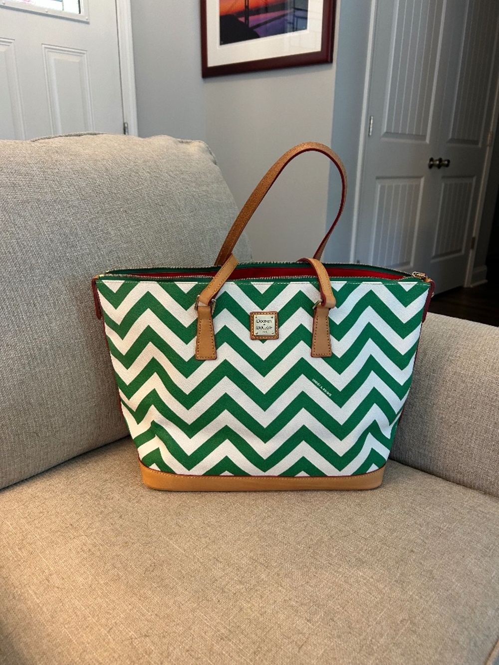 A Dooney Bourke coated cotton tote.